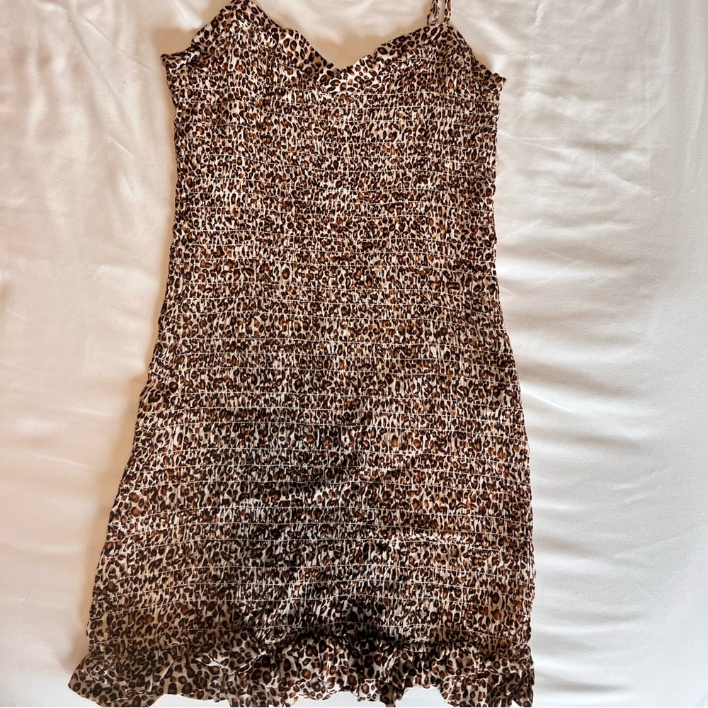 Selling a once-worn Skylar + Madison Cheetah print mini dress. (Size M), Fits SM